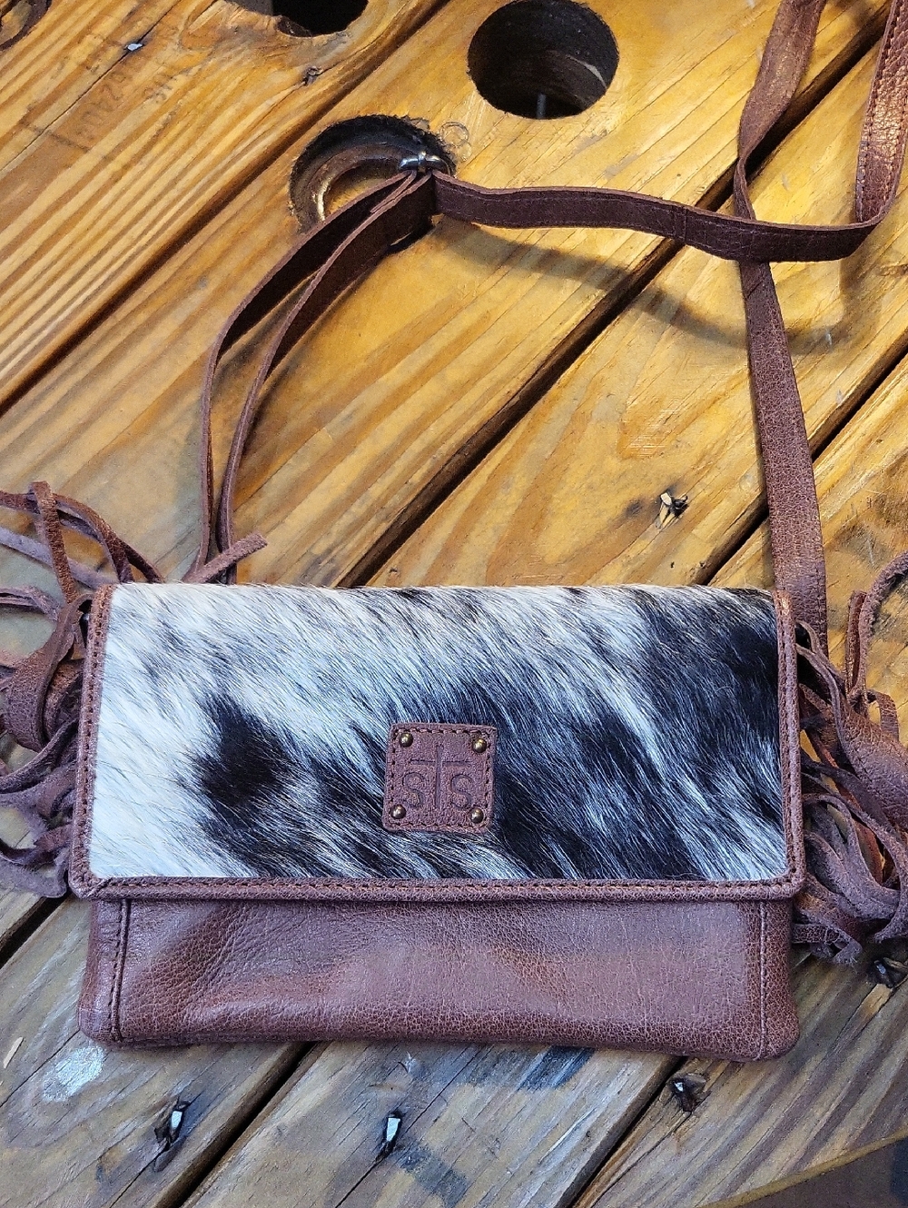 STS Ranchwear Brown Leather Crossbody with Black-and-White Haircalf Flap